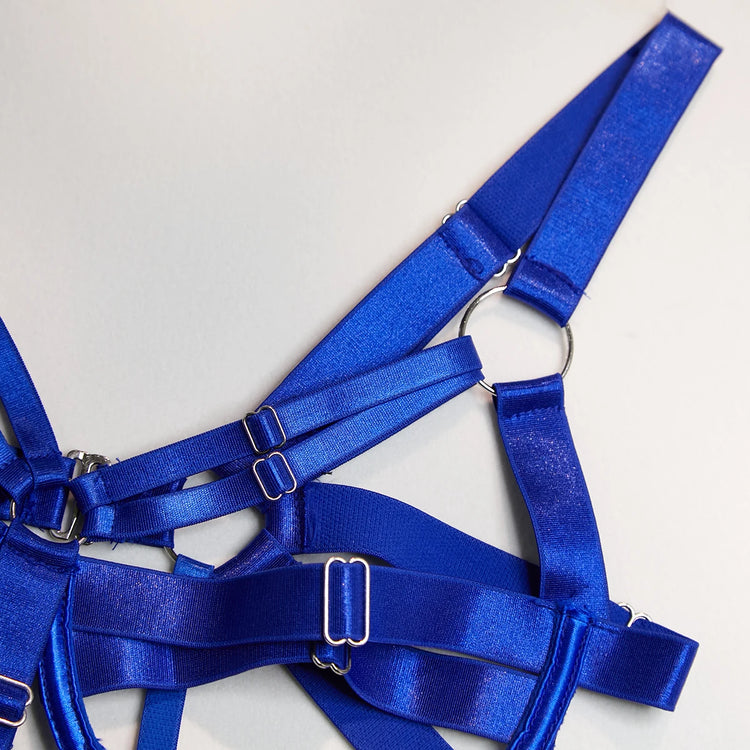 Close-up of The Harlow’s open cup bodysuit with silver-tone strappy lingerie hardware.