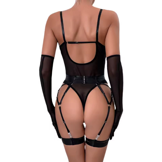 Back view of model showcasing sheer mesh and harness details in The Esme bodysuit.
