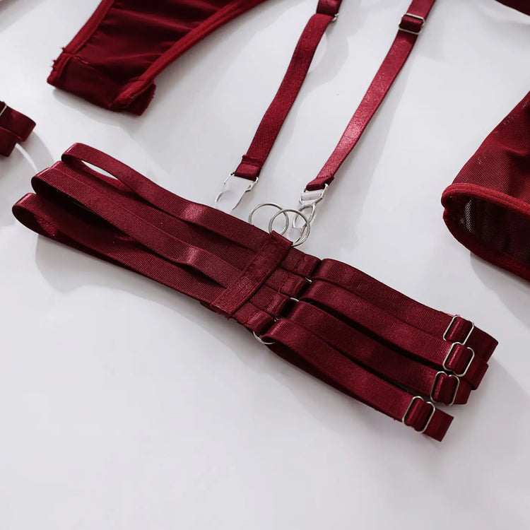 Close-up of triple-strap Suspender harness on The Esme in red.