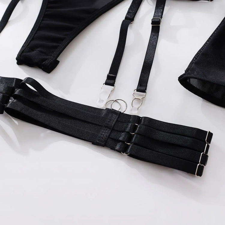  Close-up of triple-strap suspender harness on The Esme in black