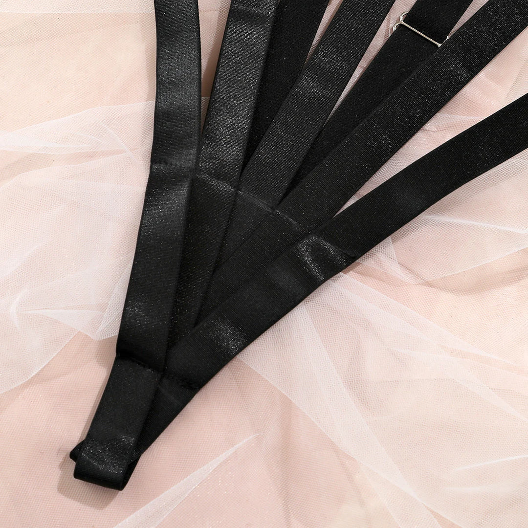 Close-up of The Harlow’s Thong with silver-tone strappy lingerie hardware.